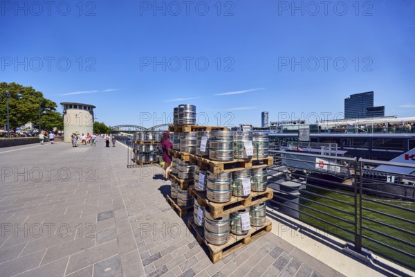 Pallets with beer barrels, boat launch, gangway, Rhine river, waterfront, level, metal railings,