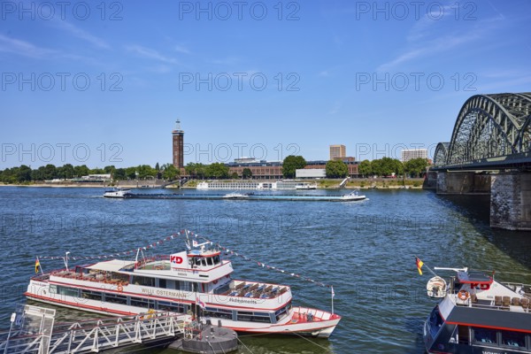 Rhine river, Hohenzollernbrücke pedestrian and railway bridge, excursion ship Willi Ostermann,