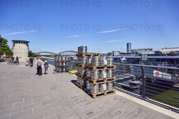 Pallets with beer barrels, boat launch, gangway, Rhine river, waterfront, level, metal railings,