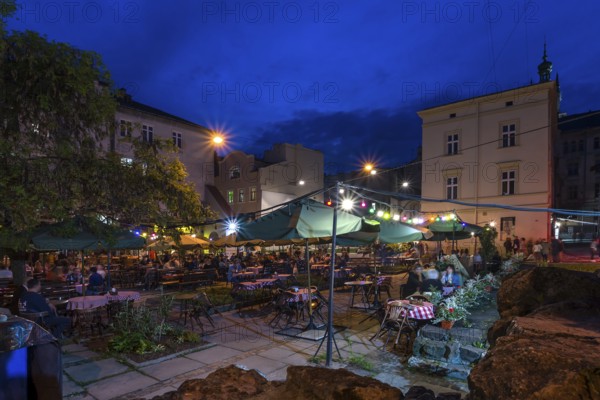 Garden restaurant in the evening, Lviv, Ukraine