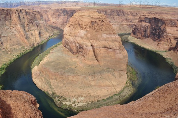 Impressive view of the Colorado River loop from Horseshoe Bend surrounded by red rocks, Arizona,