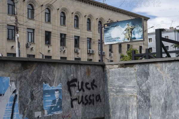 Gori, Georgia. September 10th 2025. Anti-Russia graffiti sprayed on a subway wall with a billboard