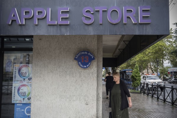 Gori, Georgia. September 9th 2025. Street sign for Stalin Avenue outside an unofficial Apple Store