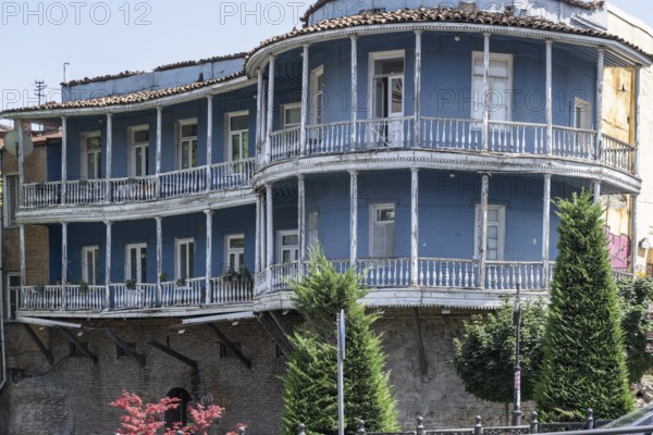 Tbilisi, Georgia. July 11th 2025. A Traditional Georgian style building with typical balcony in