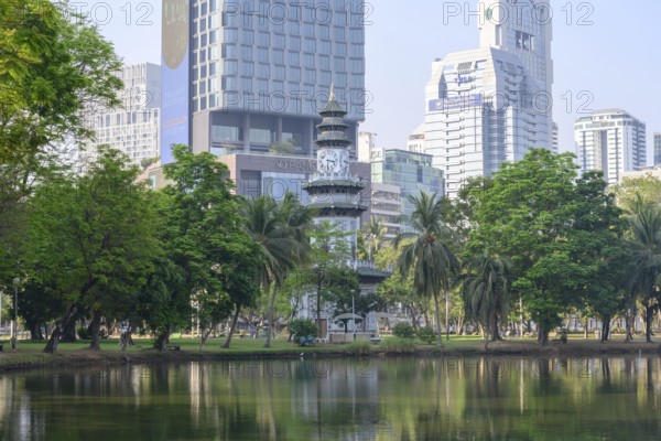 Bangkok, Thailand. March 4th 2025. The Chinese Clock Tower seen with the modern high rise buildings