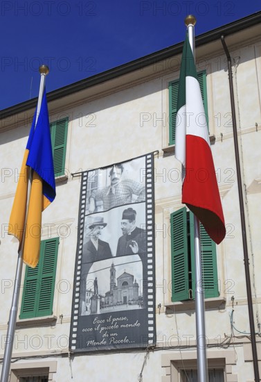 Italy, Brescello village, the town hall, Don Camillo and Peppone, flags, Italian