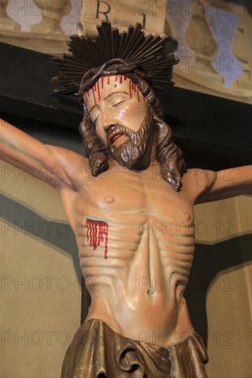 Italy, village of Brescello, cross from the movie, Don Camillo and Peppone in the church of