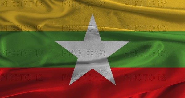 Flag of Myanmar with fabric textured background. Close up of National flag of Myanmar with