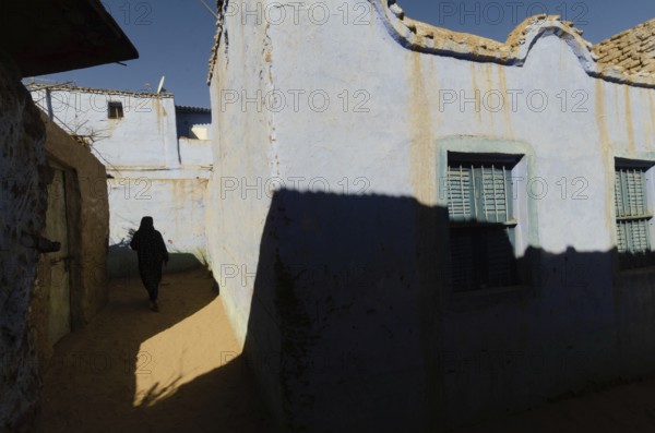 Aswan, Egypt. January 11th 2013 Bright blue traditional Nubian houses in the West bank Nile village