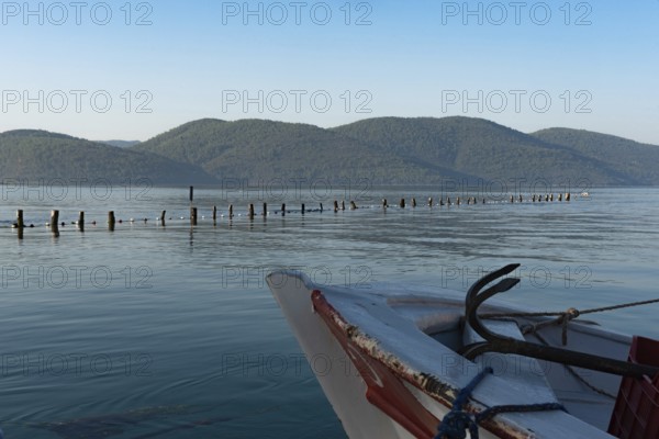 A boat moored in the beautiful harbour at the entrance to the Azmak River, at the Turkish Riviera