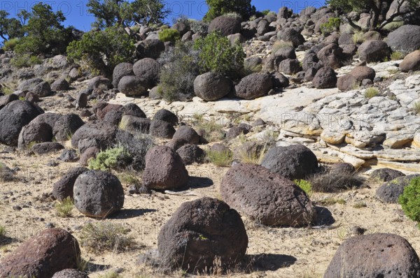 Large spherical rocks in an arid desert landscape, Grand Staircase Escalante National Monument,