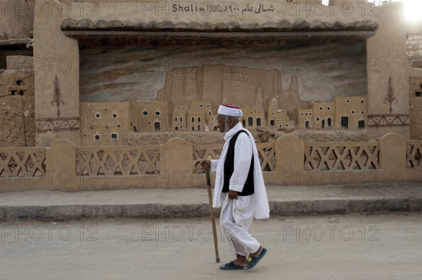 Siwa, Egypt. March 11th 2018 A local Siwian man wearing traditional clothes walking in the streets