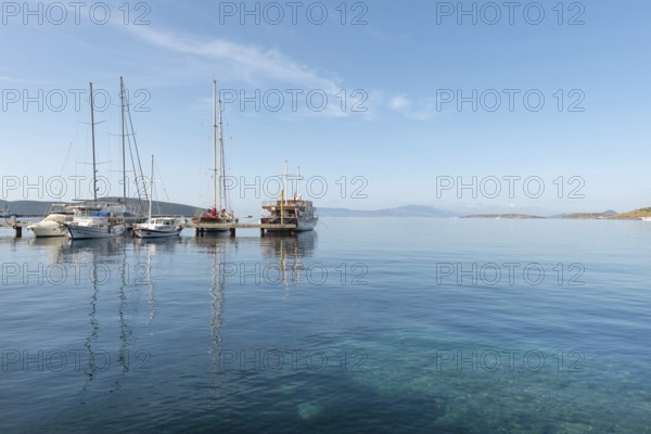 Bodrum, Mugla, Turkey. April 21st 2022 Cool morning light on yachts moored in Bodrum harbour, a