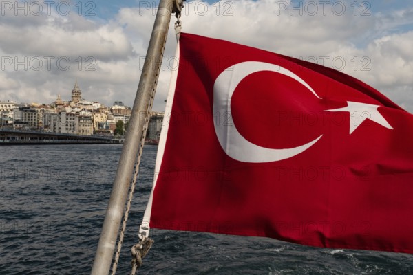 Istanbul, Turkey. September 21st 2021 Turkish flag flying from the rear of a Bosporus ferry with