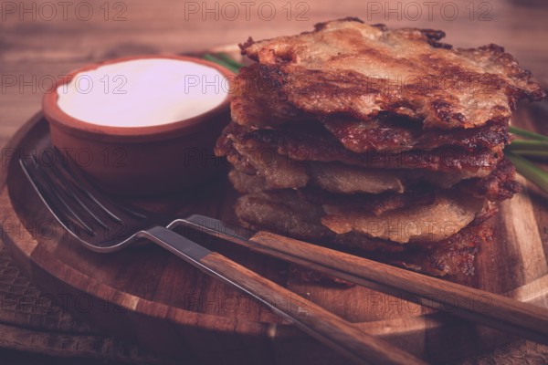 Potato pancakes, pancakes with sour cream, Belarusian dish, homemade, no people