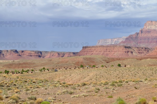 Wide desert landscape with red rocks and partly cloudy sky, Grand Canyon National Park, Arizona,