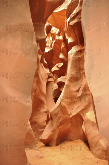 Sandstone passages with various light and shadow effects in a high, narrow canyon, Antelope Canyon,