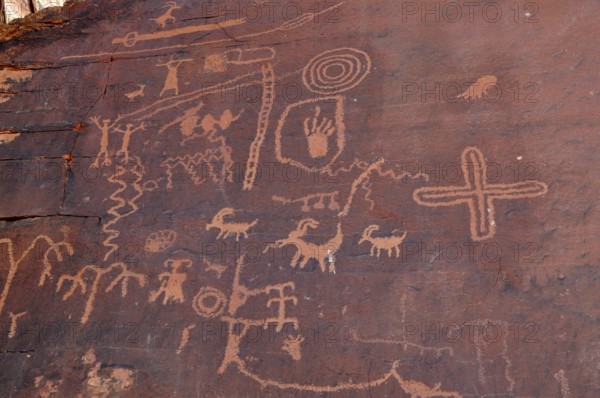 Ancient petroglyphs and symbols engraved in rock walls testify to historic art in the desert,
