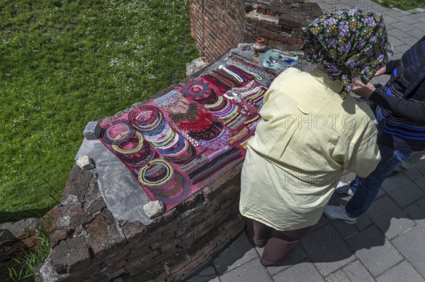 Street sale of pearl jewelry on a fortress wall, Lviv, Ukraine