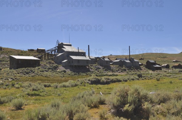 Abandoned building with chimneys in a ghost town, Gold Mine, Bodie Ghost Town, California, USA