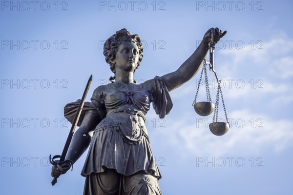 Justice, statue of the Roman goddess of justice. Römerberg, Downtown Frankfurt am Main, Hesse,