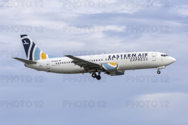 An Eastern Air Express Boeing 737-400 aircraft with license plate N438US at Miami airport, USA