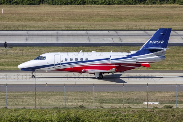 A Nicholas Air Cessna 680A Citation Latitude private jet aircraft with license plate N765PG at