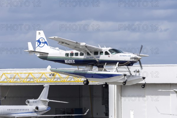A Tropic Ocean Airways Cessna 208B Grand Caravan EX aircraft with license plate N501EX at Fort