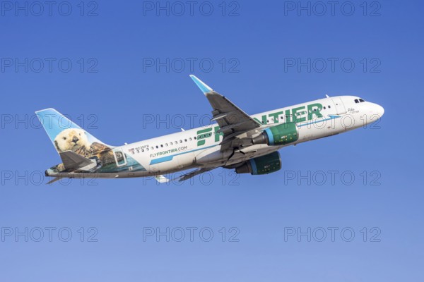 A Frontier Airlines Airbus A320 aircraft with the license plate N235FR at Phoenix airport, USA