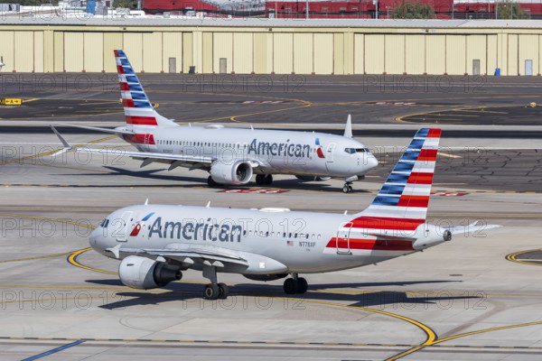 Airbus A319 and Boeing 737-8 MAX American Airlines aircraft with license plate N778XF at Phoenix