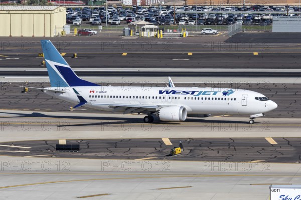 A Westjet Airlines Boeing 737-8 MAX aircraft with the license plate C-GRAX at Phoenix airport, USA