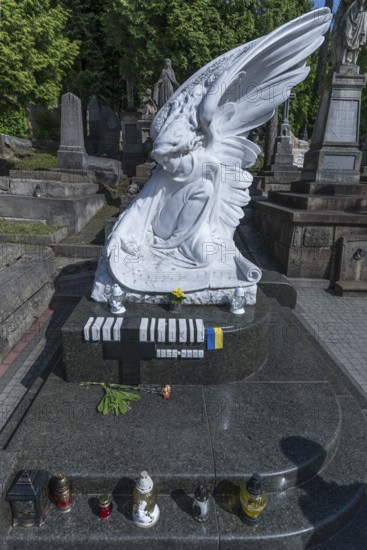 Angel sculpture on the grave of a musician, Lützenhofer cemetery Lychakivsky cemetery, Lviv,