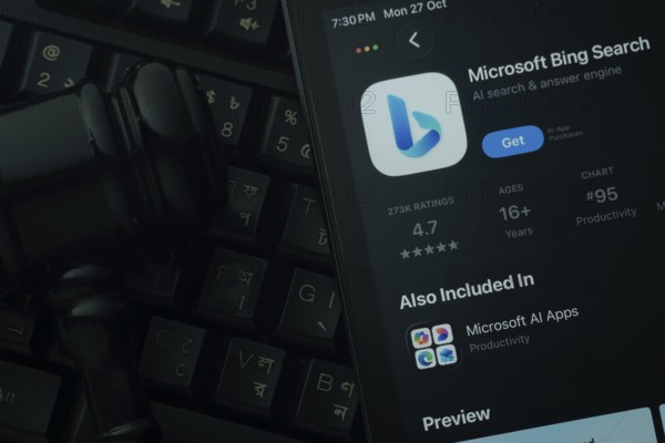 Dhaka, Bangladesh- 28 Oct 2025: An iPad displaying the Microsoft Bing app against a judge's gavel