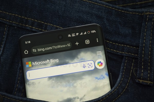 Dhaka, Bangladesh- 15 June 2025: A smartphone displaying the Microsoft Bing web interface peeks out
