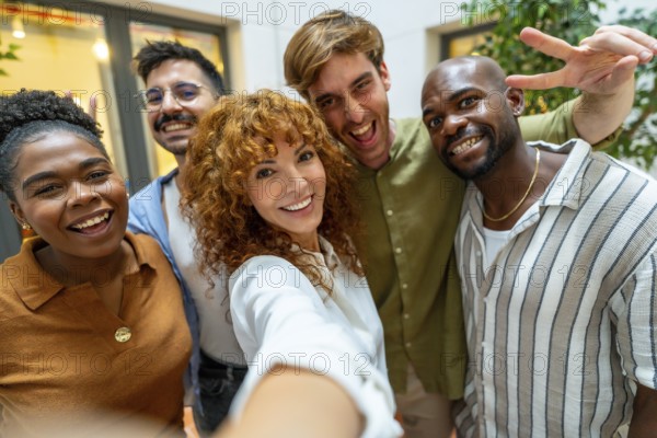 Happy business colleagues enjoying teamwork and a moment together, depicting diversity and