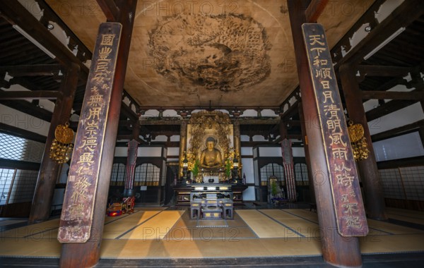 Interior view, golden Buddha figure and ceiling painting with dragon figure, Amidado, Buddhist
