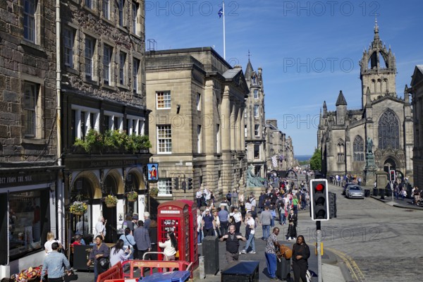 A lively street scene with Gothic buildings and lots of people, Royal Mile, Edinburgh, Scotland,