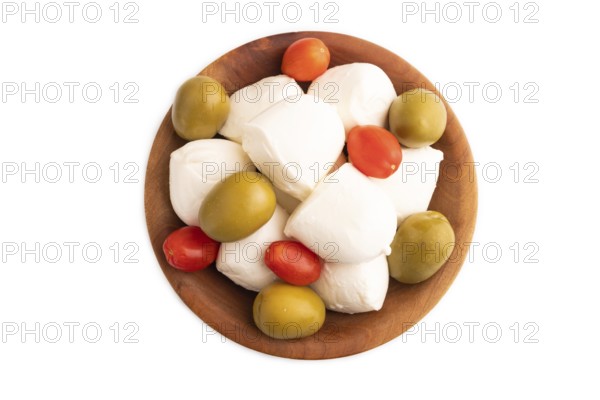 White Mozzarella cheese, with tomatoes and olives in wooden bowl Isolated on white background, top