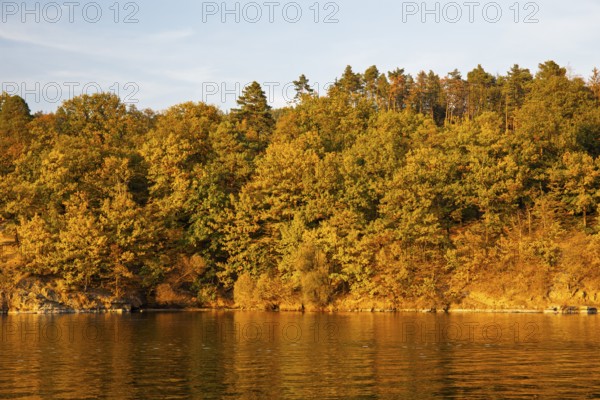 Brno Reservoir (Brnenská prehrada) on the Svratka River on a sunny autumn day. The reservoir is