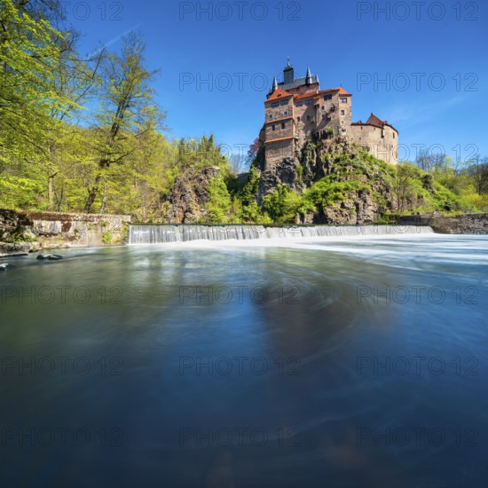 Kriebstein Castle near Mittweida across the Zschopau River with weir, Kriebstein, Saxony, Germany