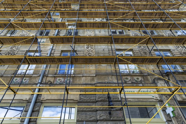 Scaffolding on a residential building, 19th century, for façade restoration, Lemberg, Ukraine