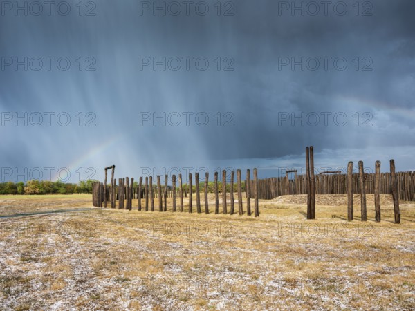 Hail showers and rainbows over the circular moat of Pömmelte, ritual site from the 3rd millennium