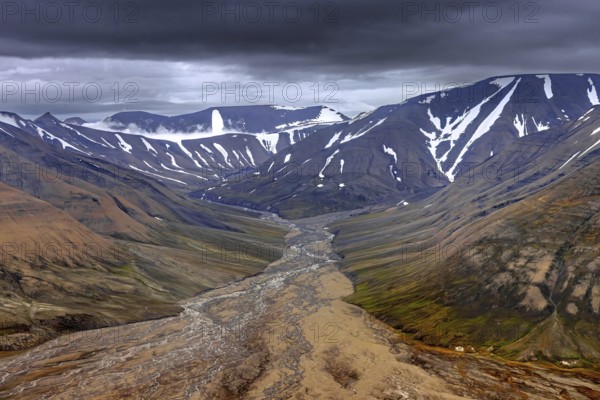 Aerial view over Adventdalen in summer, 30-kilometre valley and river Adventdalselva on the island