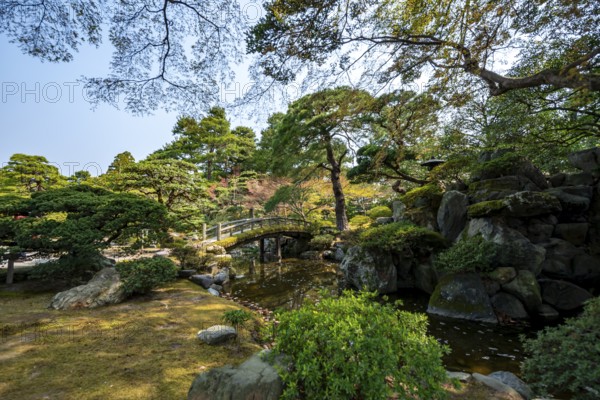 Gonaitei Garden with Dobashi Bridge over a pond, Japanese Garden, Kyoto Imperial Palace, Kyoto,