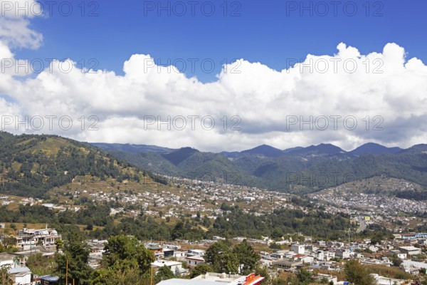 City view of Nahualá between green mountains, Highlands, Sololá Department, Guatemala