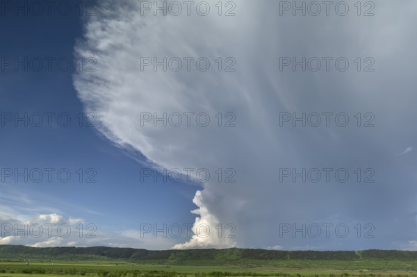 Landscape with approaching rain front (Nimbostratus), southern Carpathian Arc, Romania