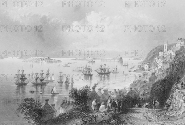 Cove or Cobh Harbour, County Cork, South Ireland, bay, Atlantic, escarpment, village with church,