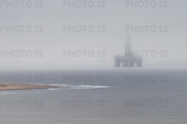 Hazy weather, oil rig near Walvis Bay, Namibia
