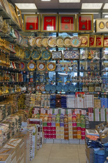 A lively gift shop full of colorful plates and traditional Turkish decorations, Konya, Central