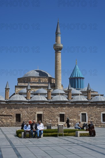 Historic mosque with impressive minaret and domes under a clear blue sky, Mevlana Museum, Mevlana,